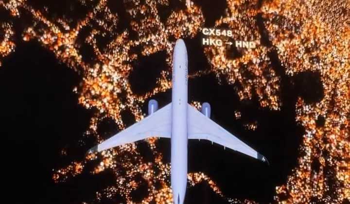 The Cathay Pacific flight on the wrap-around screens