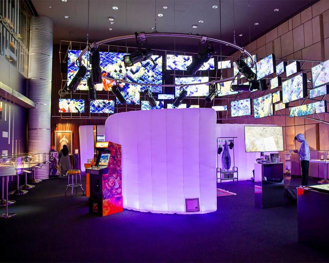 Visitor interacting with a multi-touch media exhibit